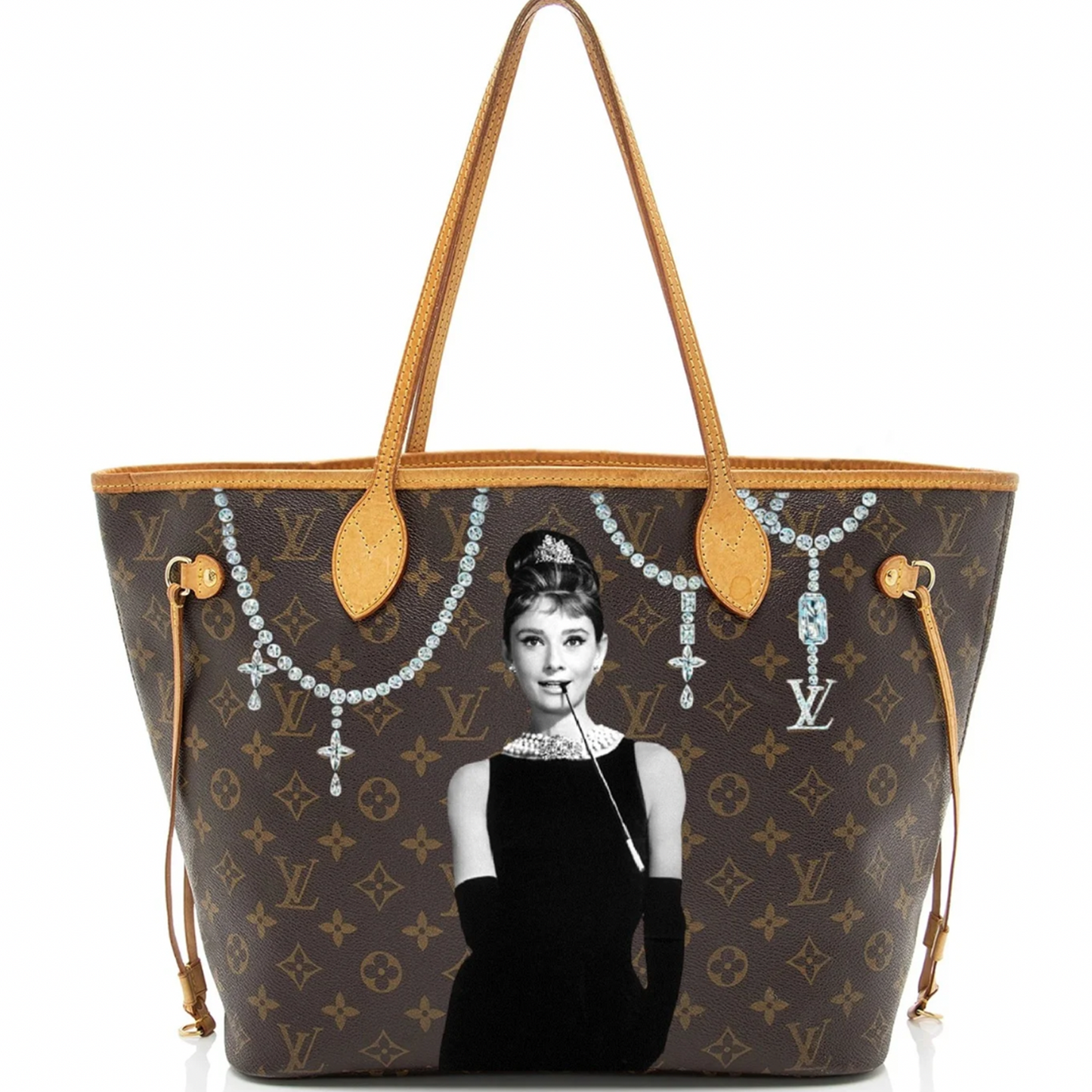 Designer handbag with a monogram pattern and a portrait of an actress on a white background