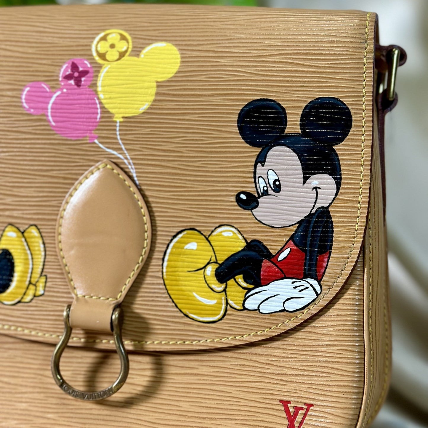 Louis Vuitton handbag with cartoon character and balloons design