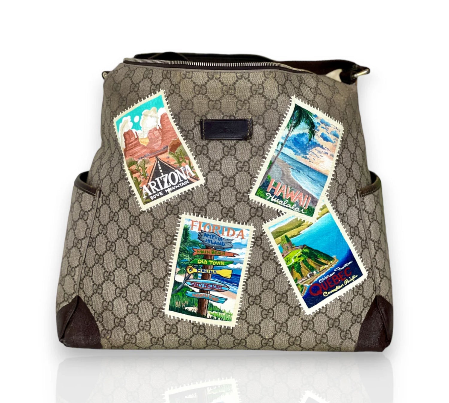Gucci handbag painted with travel stamps