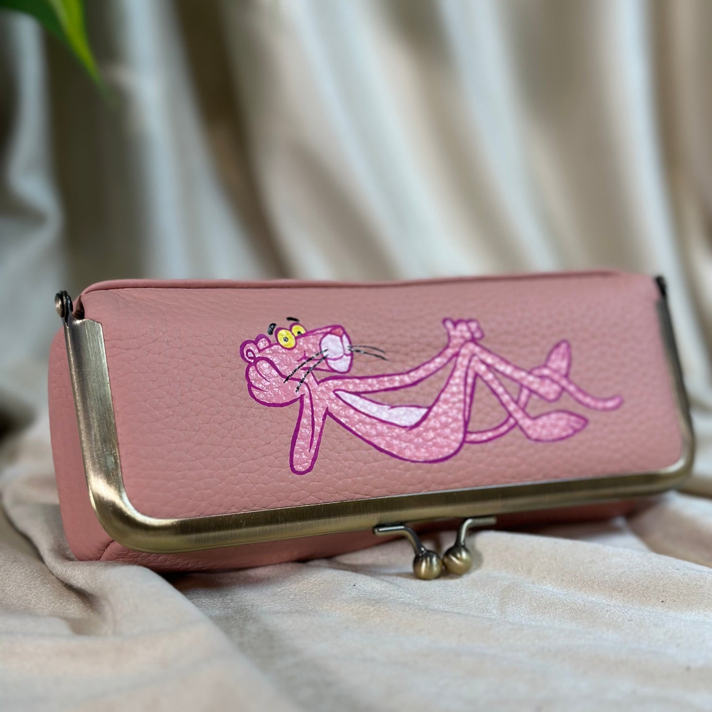 Pink Panther hand painted onto a pouch